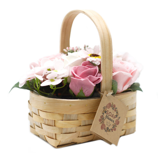 Bouquet dans un panier en osier - rose moyen